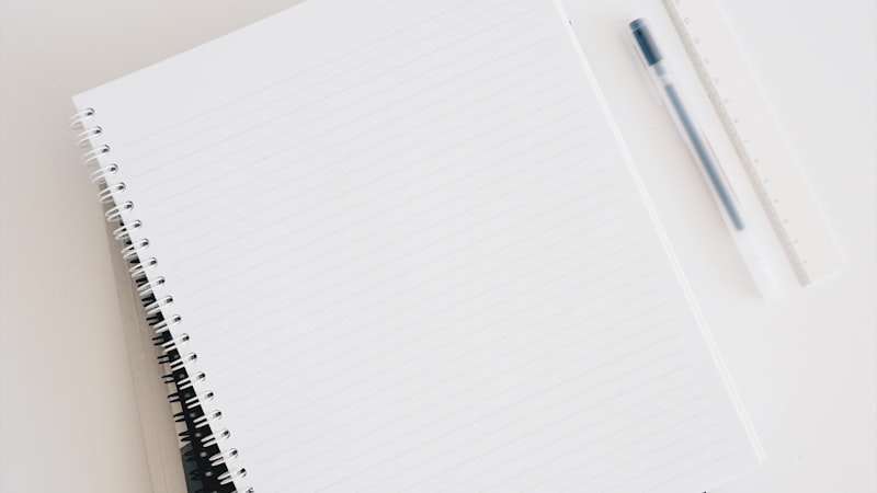 An open shadow work journal with tarot cards depicting the Tower and the Moon, used for inner child healing prompts and Jungian integration writing